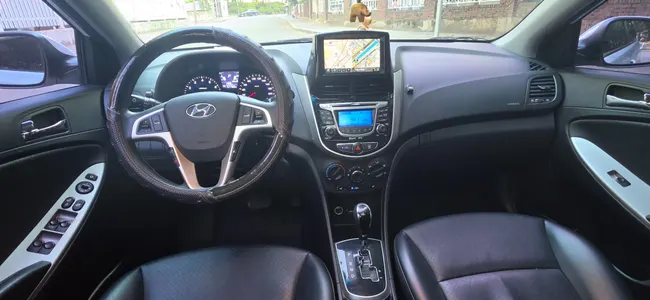 Hyundai () 1.4 VVT 2011 7